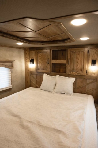 Bed in Gooseneck in IN8X15SR Infinity Edition Horse Trailer | Lakota Trailers