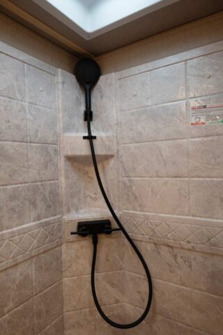 Shower in CH8X14CE Charger Edition Horse Trailer | Lakota Trailers