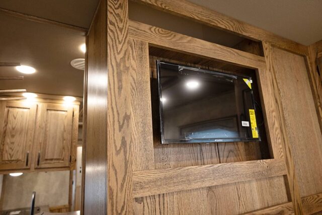 TV in Gooseneck in IN8X19BB Infinity Edition Horse Trailer | Lakota Trailers