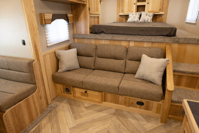 Sofa in CO8X14SR Colt Edition Horse Trailer | Lakota Trailers