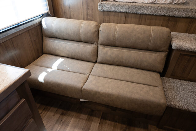 Sofa in LYX9RK Legacy Edition Horse Trailer | Lakota Trailers Sofa in LYX9RK Legacy Edition Horse Trailer | Lakota Trailers
